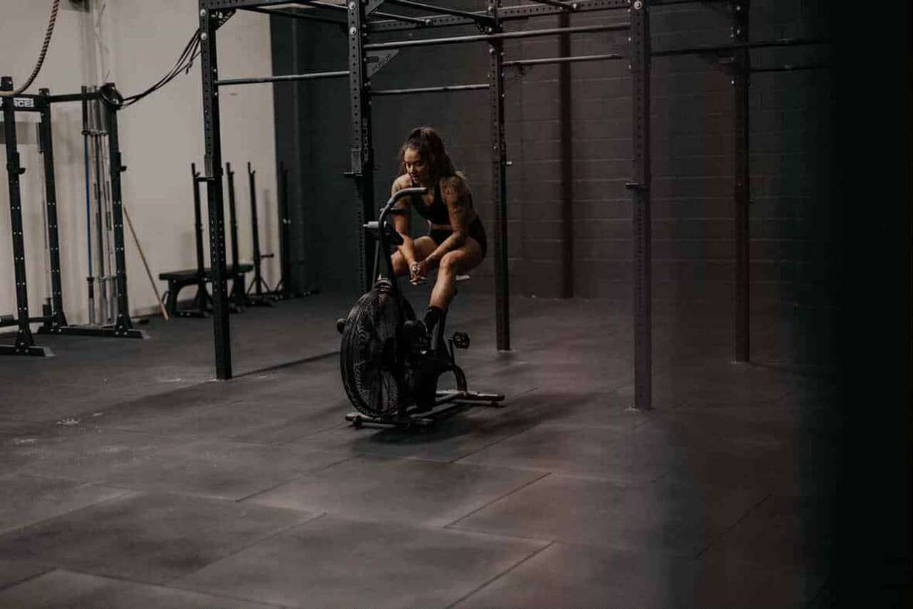 Mixed conditioning work on the gym floor at House of Hybrid, the base HYROX demands.