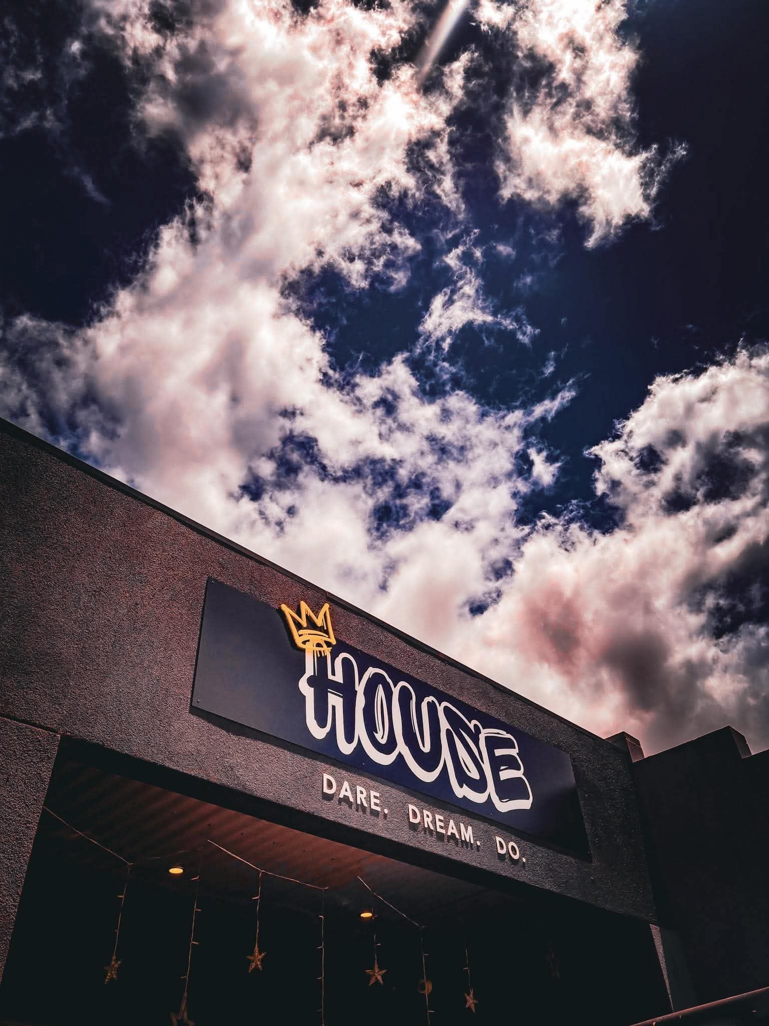 The House of Hybrid signage under a dramatic sky at the Lobethal gym